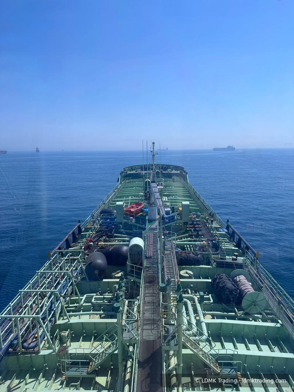 Product tanker at sea approaching terminal